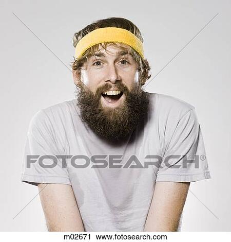 Stock Image - bearded man wearing a headband. Fotosearch