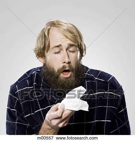 bearded man with a cold wearing a robe View Large Photo Image Stock Photo - bearded man with a cold wearing a robe. Fotosearch