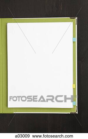Blank sheets of paper in green cover, studio shot View Large Photo Image Stock Photo - Blank sheets of paper in green cover, studio shot. Fotosearch
