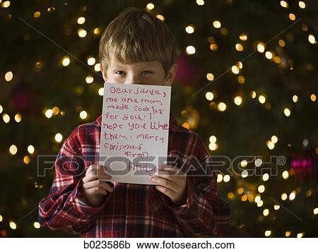 boy at christmas View Large Photo Image Stock Image - boy at christmas. Fotosearch