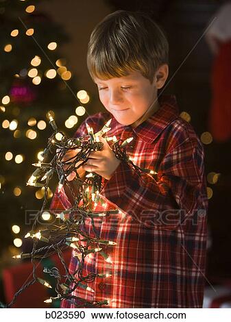 boy at christmas View Large Photo Image Stock Image - boy at christmas. Fotosearch