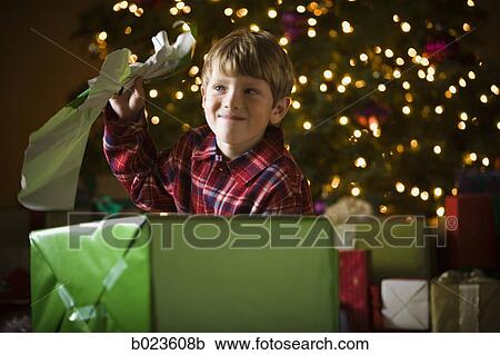 boy at christmas View Large Photo Image Stock Image - boy at christmas. Fotosearch