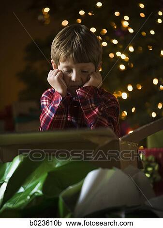 Stock Image - boy at christmas. Fotosearch