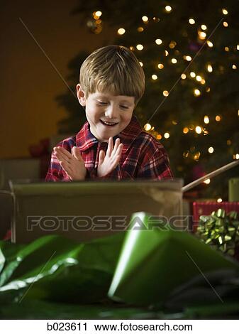 boy at christmas View Large Photo Image Stock Image - boy at christmas. Fotosearch