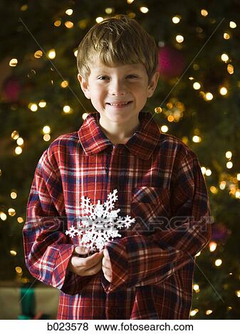 Stock Photo - boy at christmas. Fotosearch