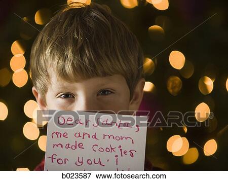 Stock Photo - boy at christmas. Fotosearch