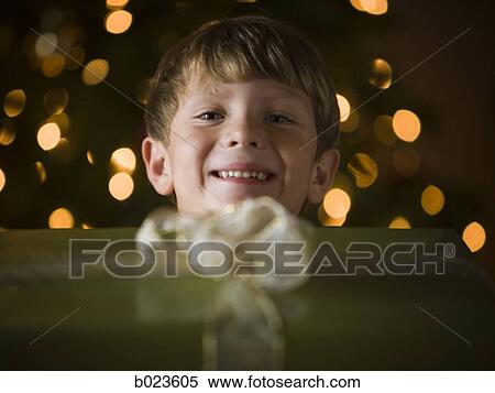 Stock Photography - boy at christmas. Fotosearch