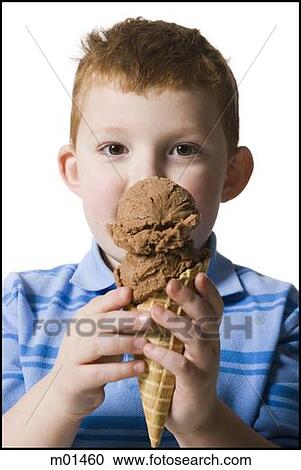 Stock Image - boy holding an ice cream cone. Fotosearch