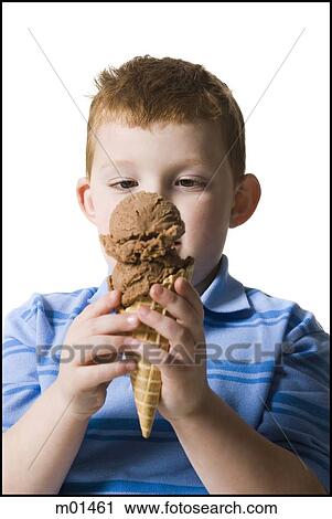 boy holding an ice cream cone View Large Photo Image Stock Image - boy holding an ice cream cone. Fotosearch
