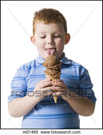 Stock Photography - boy holding an ice cream cone. Fotosearch