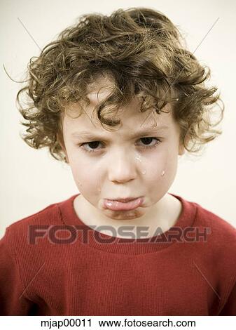 boy making a frowny face View Large Photo Image Stock Image - boy making a frowny face. Fotosearch