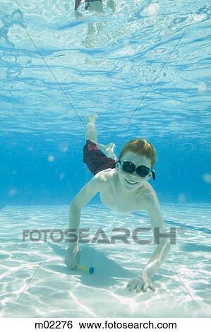 Stock Photograph - boy underwater. Fotosearch