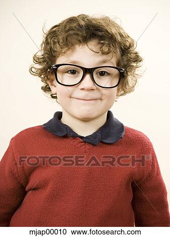 boy wearing glasses View Large Photo Image Stock Image - boy wearing glasses. Fotosearch
