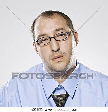 Stock Image - businessman looking at camera. Fotosearch