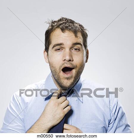 businessman looking very disheveled View Large Photo Image Stock Image - businessman looking very disheveled. Fotosearch