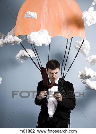 Stock Image - businessman parachuting. Fotosearch
