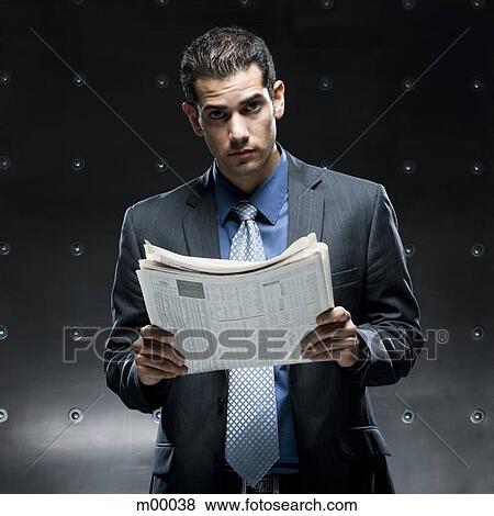businessman reading a newspaper View Large Photo Image Stock Photo - businessman reading a newspaper. Fotosearch