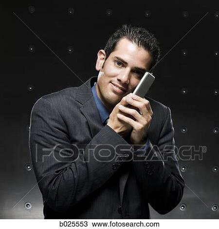 businessman using a cell phone View Large Photo Image Stock Image - businessman using a cell phone. Fotosearch