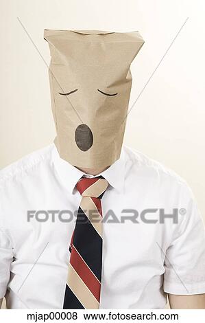 Stock Photo - businessman with a brown paper bag over his head. Fotosearch
