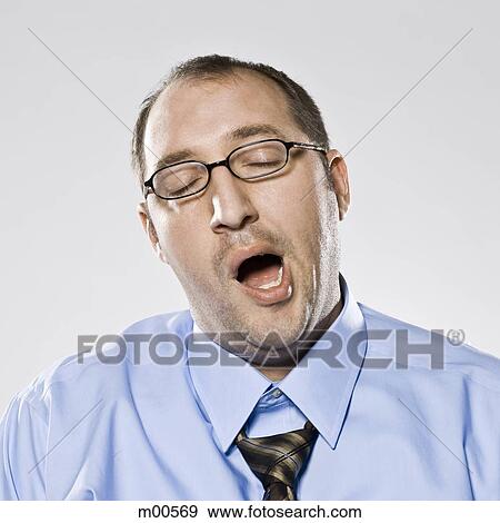 businessman yawning View Large Photo Image Stock Photo - businessman yawning. Fotosearch