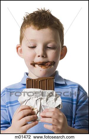 child eating chocolate View Large Photo Image Stock Image - child eating chocolate. Fotosearch
