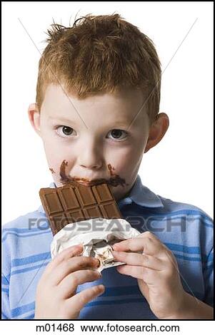 child eating chocolate View Large Photo Image Stock Photo - child eating chocolate. Fotosearch