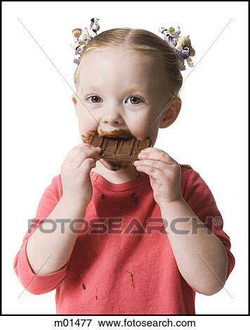 child eating chocolate View Large Photo Image Stock Photo - child eating chocolate. Fotosearch