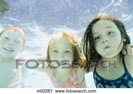 Stock Photo - children in a swimming pool. Fotosearch