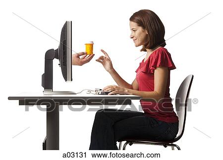Conceptual picture of young woman receiving pill bottle out of her computer View Large Photo Image Stock Image - Conceptual picture of young woman receiving pill bottle out of her computer. Fotosearch