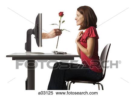 Conceptual picture of young woman receiving red rose out of her computer View Large Photo Image Stock Photography - Conceptual picture of young woman receiving red rose out of her computer. Fotosearch