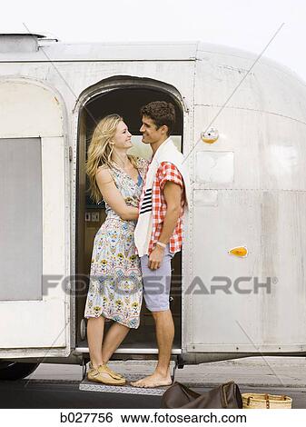 couple in front of their airstream classic trailer View Large Photo Image Stock Photograph - couple in front of their airstream classic trailer. Fotosearch