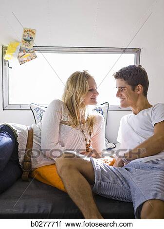 couple kissing inside a trailer View Large Photo Image Stock Image - couple kissing inside a trailer. Fotosearch