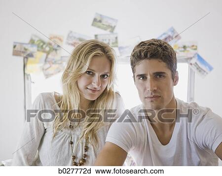 Stock Image - couple kissing inside a trailer. Fotosearch