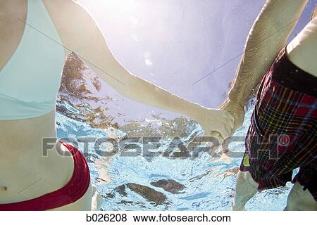 couple underwater View Large Photo Image Stock Photo - couple underwater. Fotosearch