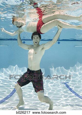 couple underwater View Large Photo Image Stock Photo - couple underwater. Fotosearch