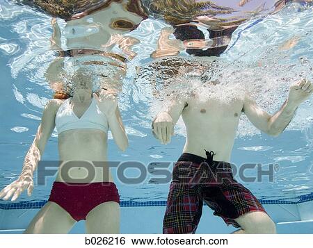 Stock Photograph - couple underwater. Fotosearch