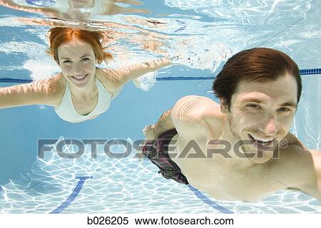 Stock Photography - couple underwater. Fotosearch