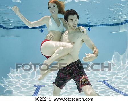 couple underwater View Large Photo Image Stock Photography - couple underwater. Fotosearch