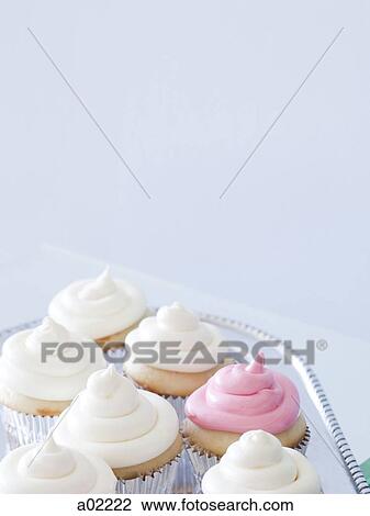 Cupcakes with frosting on silver tray, close-up, copy space View Large Photo Image Stock Image - Cupcakes with frosting on silver tray, close-up, copy space. Fotosearch