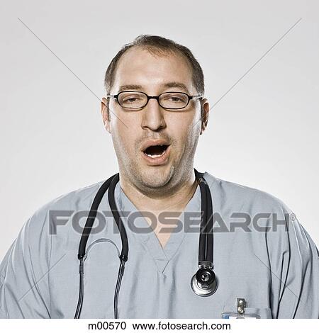 doctor yawning View Large Photo Image Stock Image - doctor yawning. Fotosearch