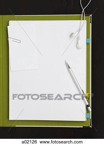 Earphones, pencil and paper clip on blank paper with file View Large Photo Image Stock Photograph - Earphones, pencil and paper clip on blank paper with file. Fotosearch