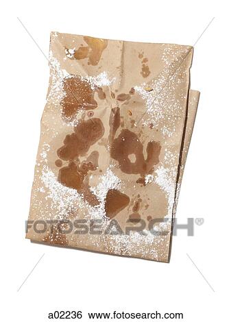 Stock Photograph - Empty paper bag stained with oil and powdered sugar, view from above, studio shot. Fotosearch