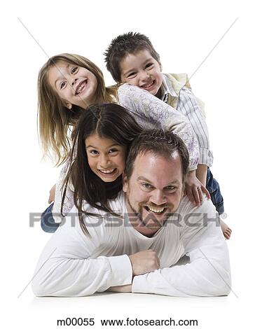 father and three children lying on top of each other View Large Photo Image Stock Photography - father and three children lying on top of each other. Fotosearch