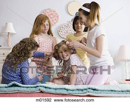five girls on a bed View Large Photo Image Stock Image - five girls on a bed. Fotosearch