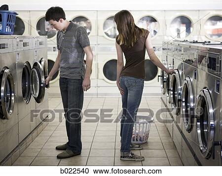flirting at the laundromat View Large Photo Image Stock Image - flirting at the laundromat. Fotosearch