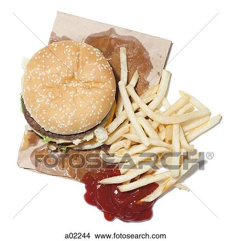 Picture - French fries and hamburger, studio shot. Fotosearch