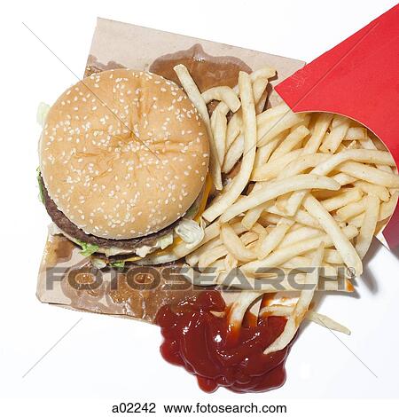 French fries and hamburger, studio shot View Large Photo Image Stock Image - French fries and hamburger, studio shot. Fotosearch