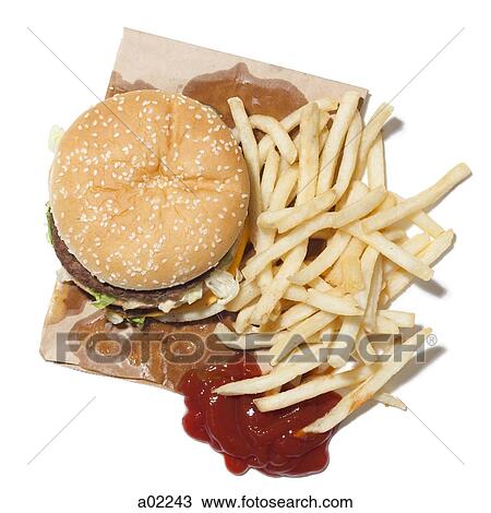 French fries and hamburger, studio shot View Large Photo Image Stock Image - French fries and hamburger, studio shot. Fotosearch