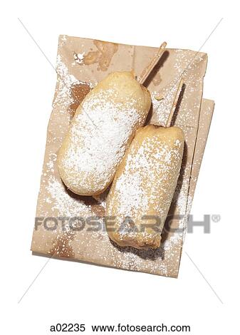 Freshly fried donuts with powdered sugar on brown paper bag, studio shot View Large Photo Image Stock Photography - Freshly fried donuts with powdered sugar on brown paper bag, studio shot. Fotosearch