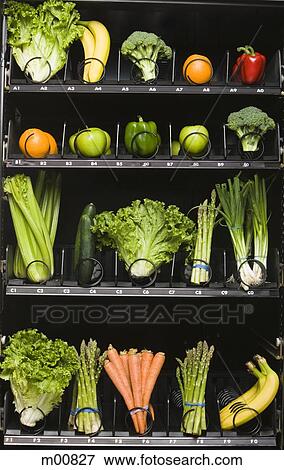Stock Photo - fruit and vegetables in a vending machine. Fotosearch